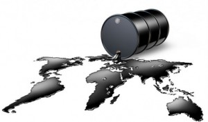 [ Dessin infographique : du pétrole a coulé d'un baril noir et forme les continents de la Terre.]